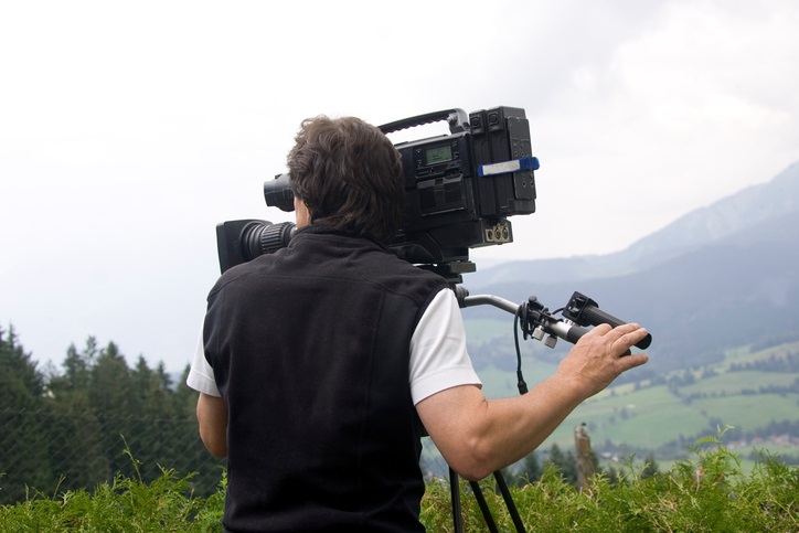 Cameraman in Mountains